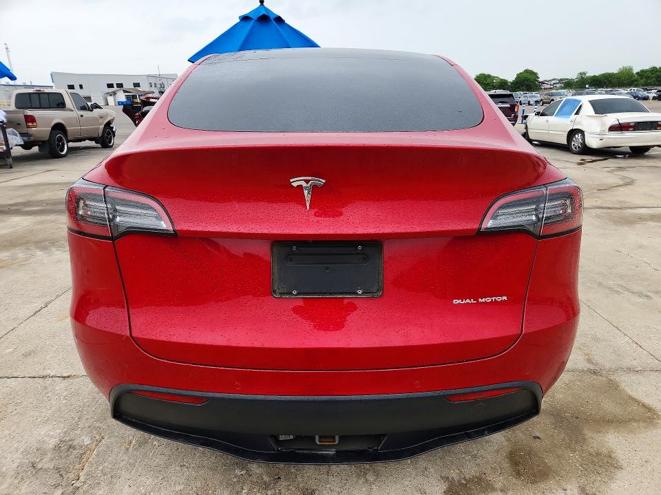 2021 Tesla Model y VIN 5YJYGDEE6MF230773 COPART salvage auction — SIDE, Tx - Salvage Vehicle Title, sold $14,100 on 2026-07-20 (photo 6)