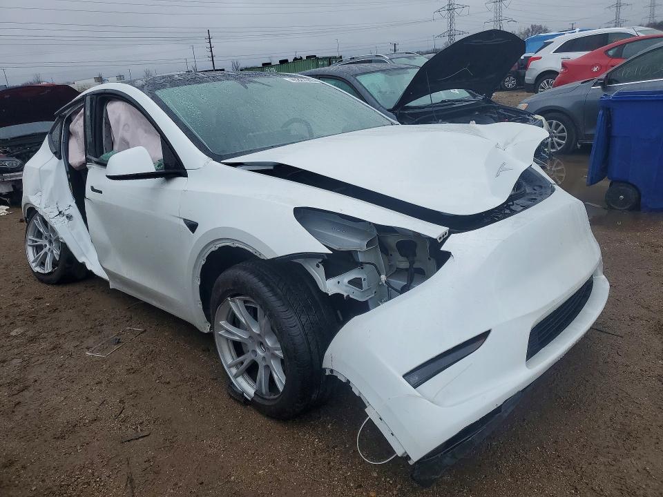 2023 Tesla Model y VIN 7SAYGDEEXPF809921 COPART salvage auction — ALL OVER, Il - Salvage Certificate, sold $1,650 on 2026-07-07 (photo 4)