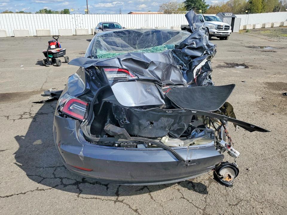 2018 Tesla Model 3 VIN 5YJ3E1EA8JF050976 COPART salvage auction — ALL OVER, Or - Salvage Title Certificate, sold $2,000 on 2026-07-22 (photo 6)