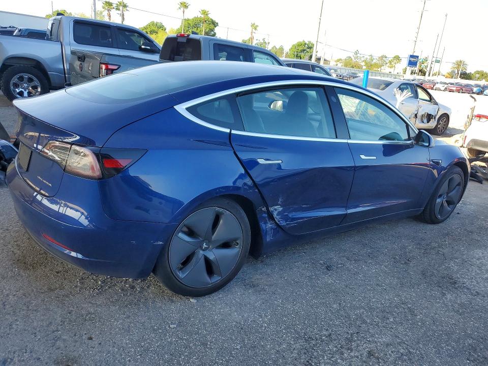 2020 Tesla Model 3 VIN 5YJ3E1EB9LF803104 COPART salvage auction — SIDE, FL, sold $3,750 on 2026-07-24 (photo 3)