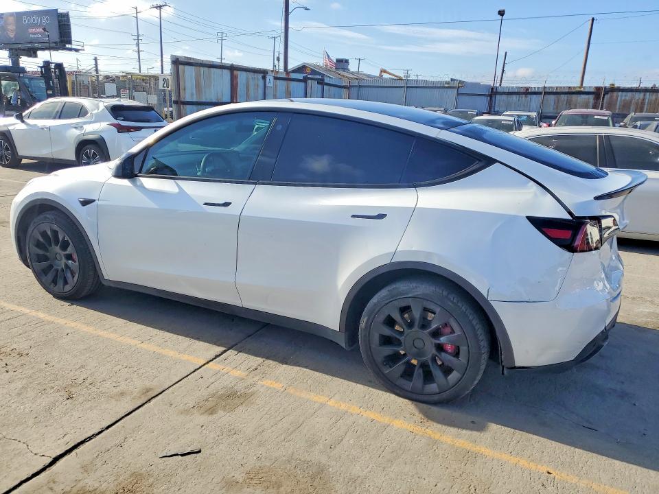 2023 Tesla Model y VIN 7SAYGDEE0PA052489 COPART salvage auction — REAR END, Ca - Salvage Certificate, sold $14,300 on 2026-07-29 (photo 2)