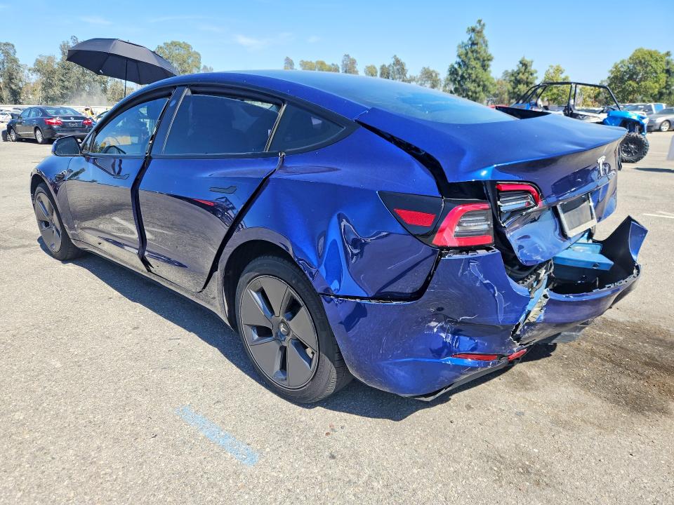 2023 Tesla Model 3 VIN 5YJ3E1EA6PF463312 COPART salvage auction — REAR END, Ca - Salvage Certificate, sold $4,400 on 2026-07-02 (photo 2)
