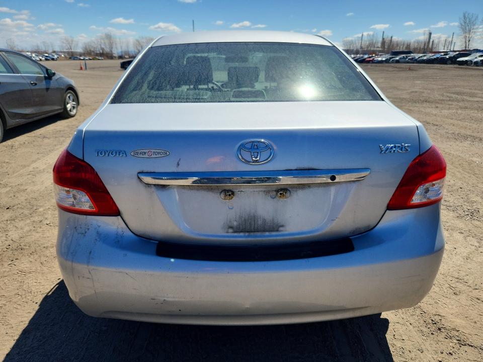 2010 Toyota Yaris VIN JTDBT4K39A1362872 COPART salvage auction — SIDE, Qc - Gravement Accidente, sold $1,450 on 2026-07-21 (photo 6)