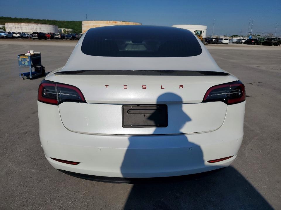 2020 Tesla Model 3 VIN 5YJ3E1EAXLF740554 COPART salvage auction — FRONT END, Fl - Cert Of Title Slvg Rebuildable, sold $4,700 on 2026-08-01 (photo 6)