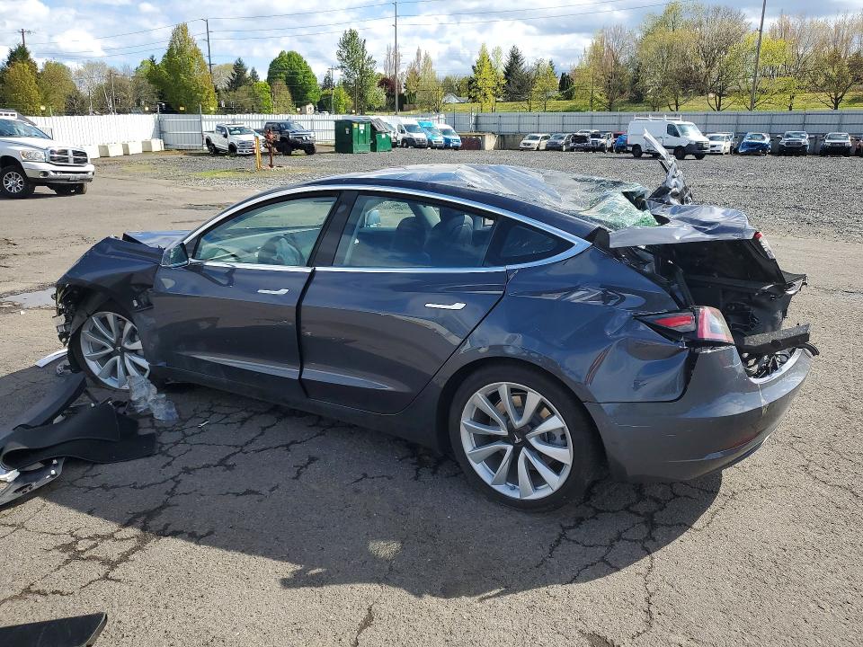 2018 Tesla Model 3 VIN 5YJ3E1EA8JF050976 COPART salvage auction — ALL OVER, Or - Salvage Title Certificate, sold $2,000 on 2026-07-22 (photo 2)