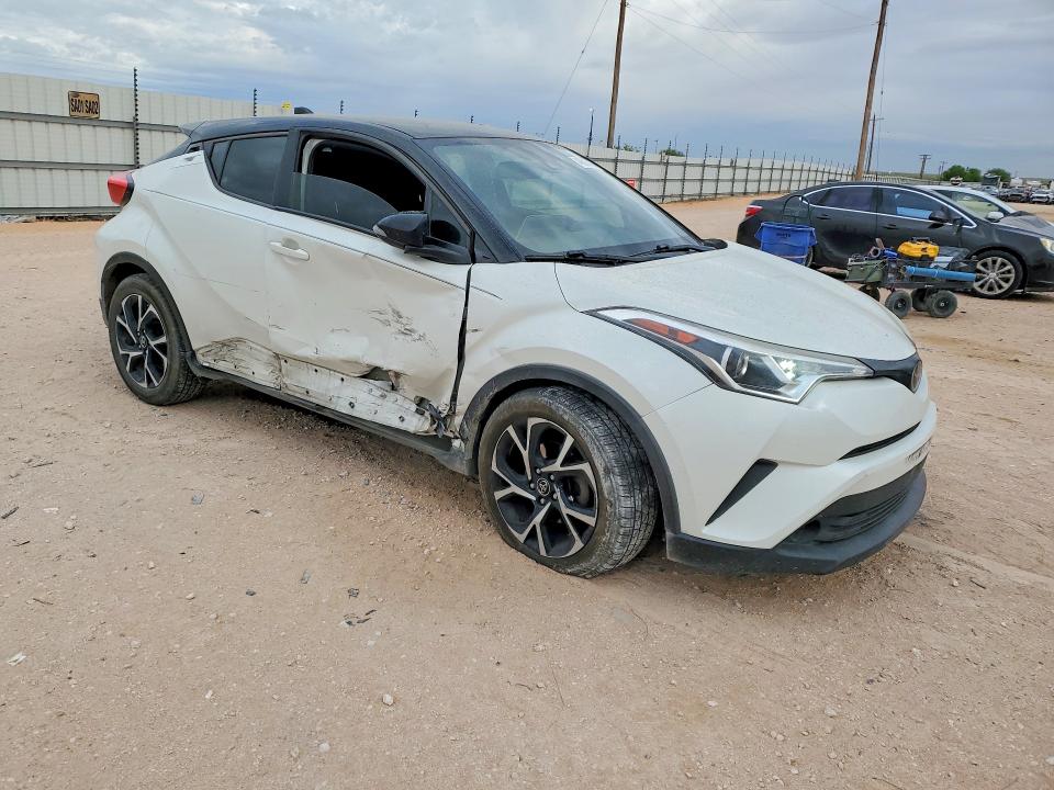 2019 Toyota C-hr VIN NMTKHMBX0KR100634 COPART salvage auction — SIDE, Tx - Salvage Vehicle Title, sold $5,500 on 2026-07-08 (photo 4)