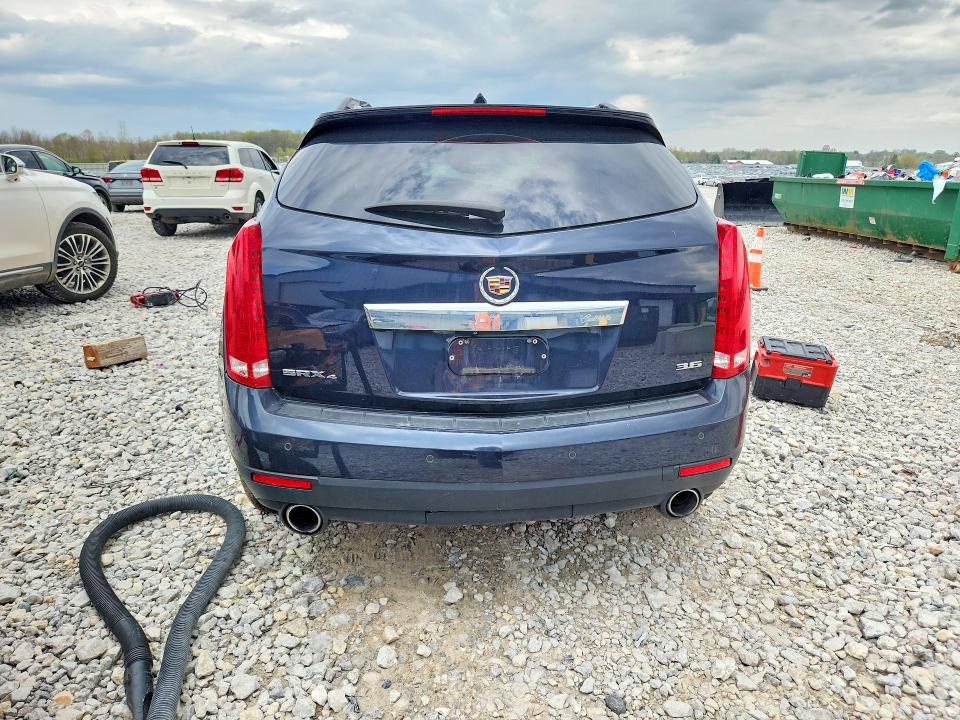 2014 Cadillac Srx VIN 3GYFNFE31ES583433 COPART salvage auction — ROLLOVER, MI - CERTIFICATE OF TITLE, sold $300 on 2026-07-02 (photo 6)