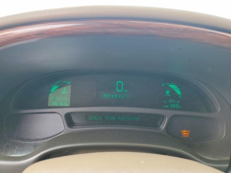2004 Cadillac De ville VIN 1G6KD54Y64U224515 COPART salvage auction — REAR END, IN - CERT OF TITLE-SALVAGE TITLE, sold $450 on 2026-07-07 (photo 9)