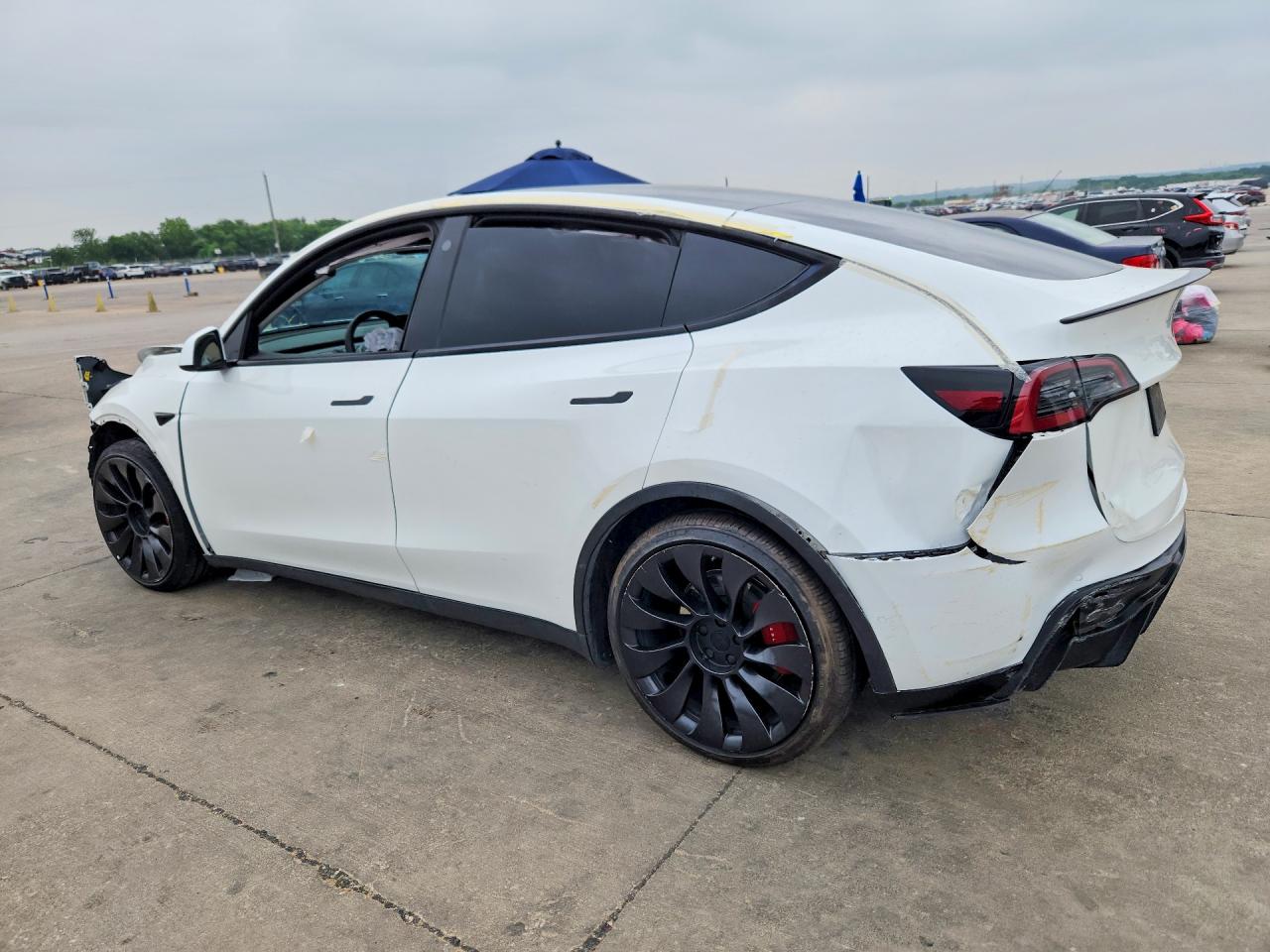2022 Tesla Model Y VIN 7SAYGDEF0NF452268 COPART salvage auction — Front End, TX - CERTIFICATE OF TITLE, sold $6,900 on 2026-07-09 (photo 2)