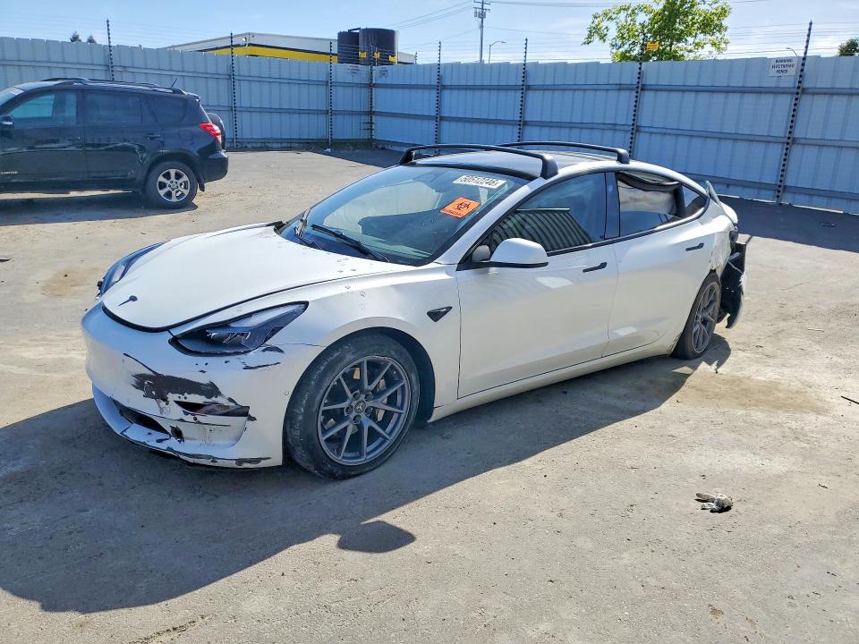 2022 Tesla Model 3 VIN 5YJ3E1EA7NF374670 COPART salvage auction — SIDE, Salvage Title, sold $2,700 on 2026-07-16 (photo 1)