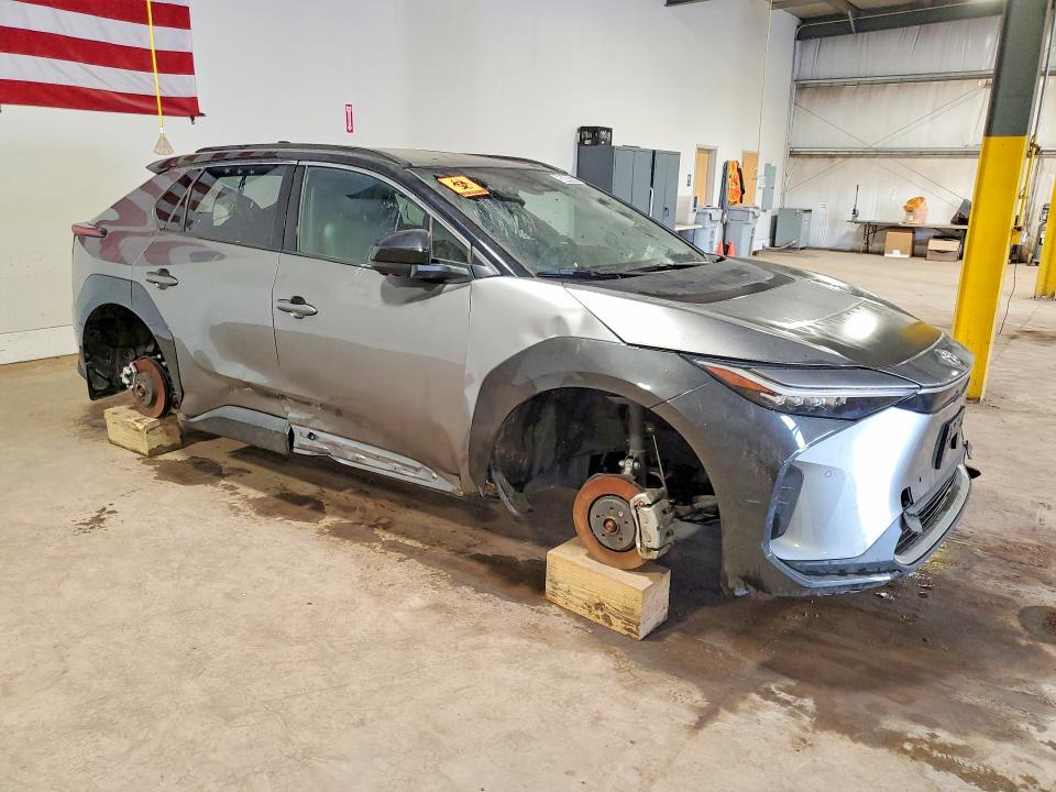 2023 Subaru Solterra VIN JTMABABA1PA005688 COPART salvage auction — STRIPPED, Pa - Certificate Of Salvage, sold $3,200 on 2026-07-09 (photo 4)