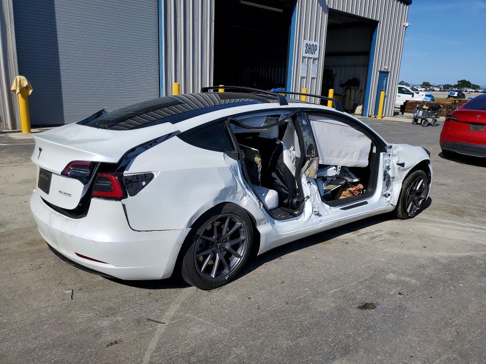 2022 Tesla Model 3 VIN 5YJ3E1EA7NF374670 COPART salvage auction — SIDE, Salvage Title, sold $2,700 on 2026-07-16 (photo 3)