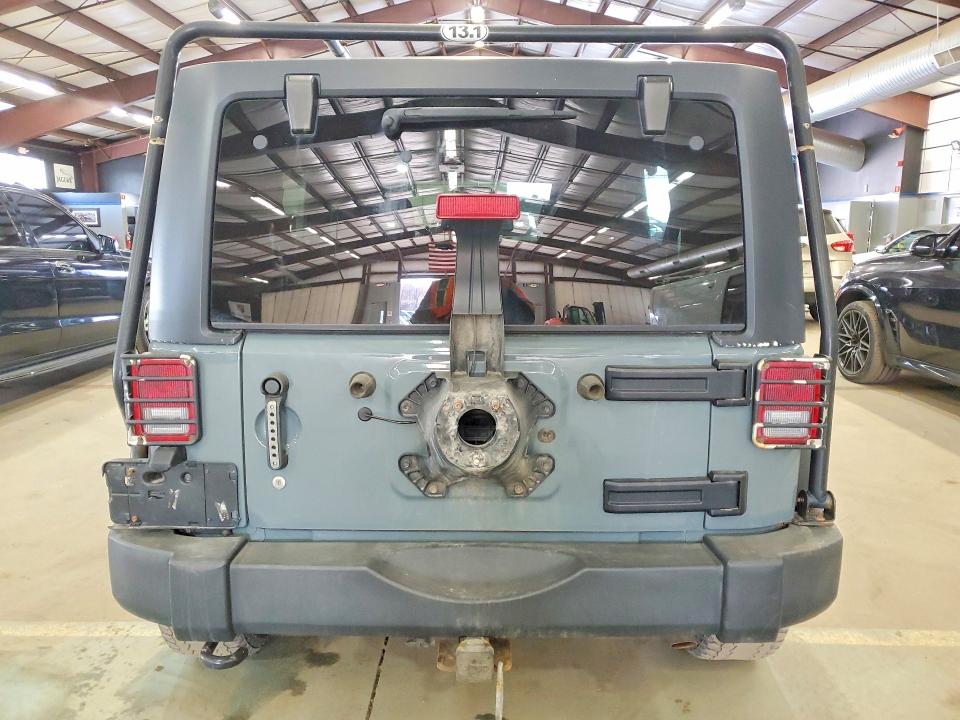 2014 Jeep Wrangler unlimited VIN 1C4BJWDG2EL118069 COPART salvage auction — ROOF, Vt - Certificate Of Title, sold $5,400 on 2026-07-24 (photo 6)