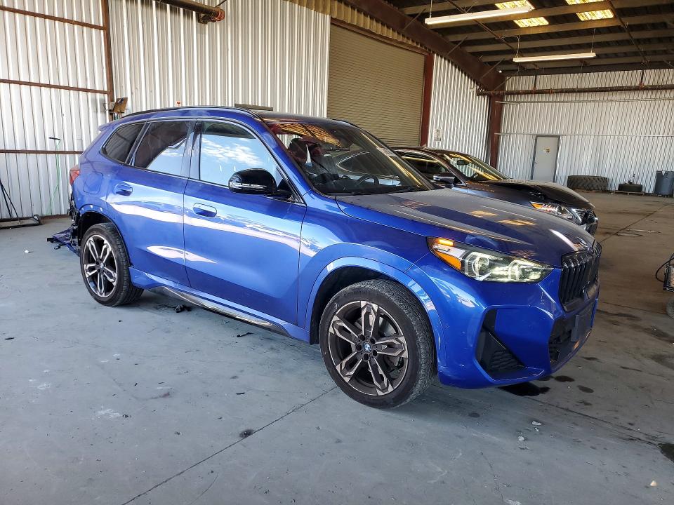 2023 BMW X1 VIN WBX73EF0XP5Y06910 COPART salvage auction — SIDE, Ca - Salvage Certificate, sold $14,000 on 2026-07-30 (photo 4)