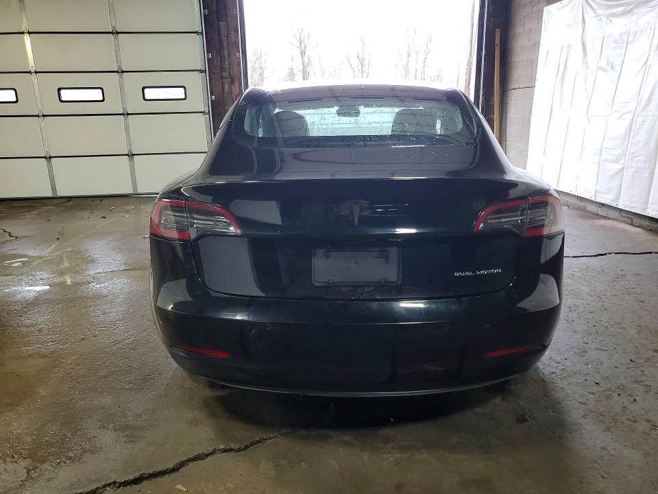 2019 Tesla Model 3 VIN 5YJ3E1EB6KF208872 COPART salvage auction — NORMAL WEAR, WV - CERTIFICATE OF TITLE, sold $8,200 on 2026-07-09 (photo 6)