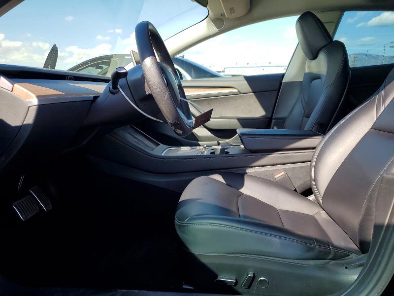 2023 Tesla Model 3 VIN 5YJ3E1EA8PF562228 COPART salvage auction — REAR END, Ca - Salvage Certificate, sold $6,000 on 2026-07-06 (photo 7)