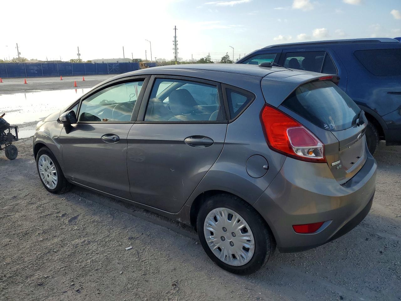 2014 Ford Fiesta VIN 3FADP4EE6EM216034 COPART salvage auction — Minor Dent/Scratches, FL - CERTIFICATE OF TITLE, sold $275 on 2026-07-01 (photo 2)