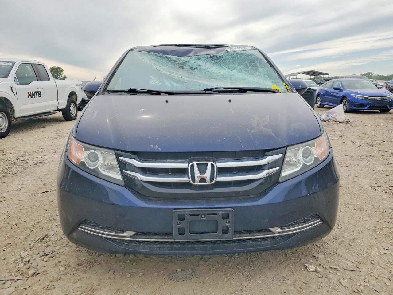 2014 Honda Odyssey VIN 5FNRL5H68EB035799 COPART salvage auction — Top/Roof, TX - SALVAGE VEHICLE TITLE, sold $1,550 on 2026-07-07 (photo 5)