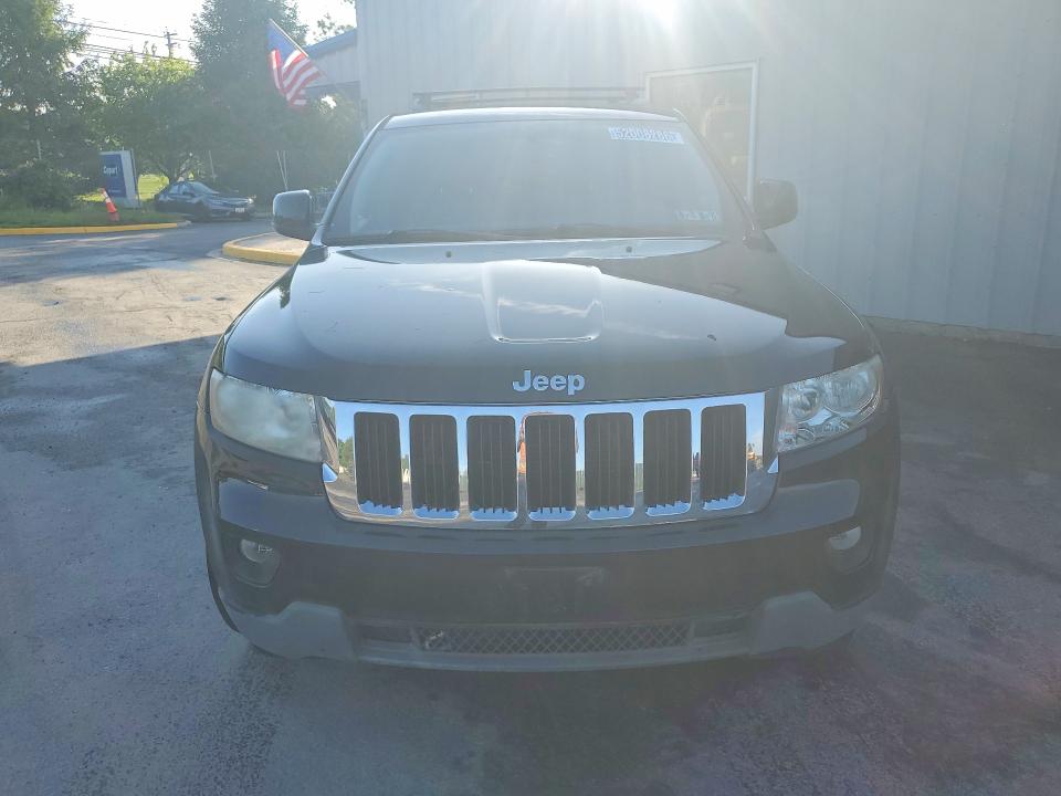 2011 Jeep Grand cherokee VIN 1J4RR4GG2BC657630 COPART salvage auction — MINOR DENT/SCRATCHES, Wv - Certificate Of Title, sold $425 on 2026-07-06 (photo 5)