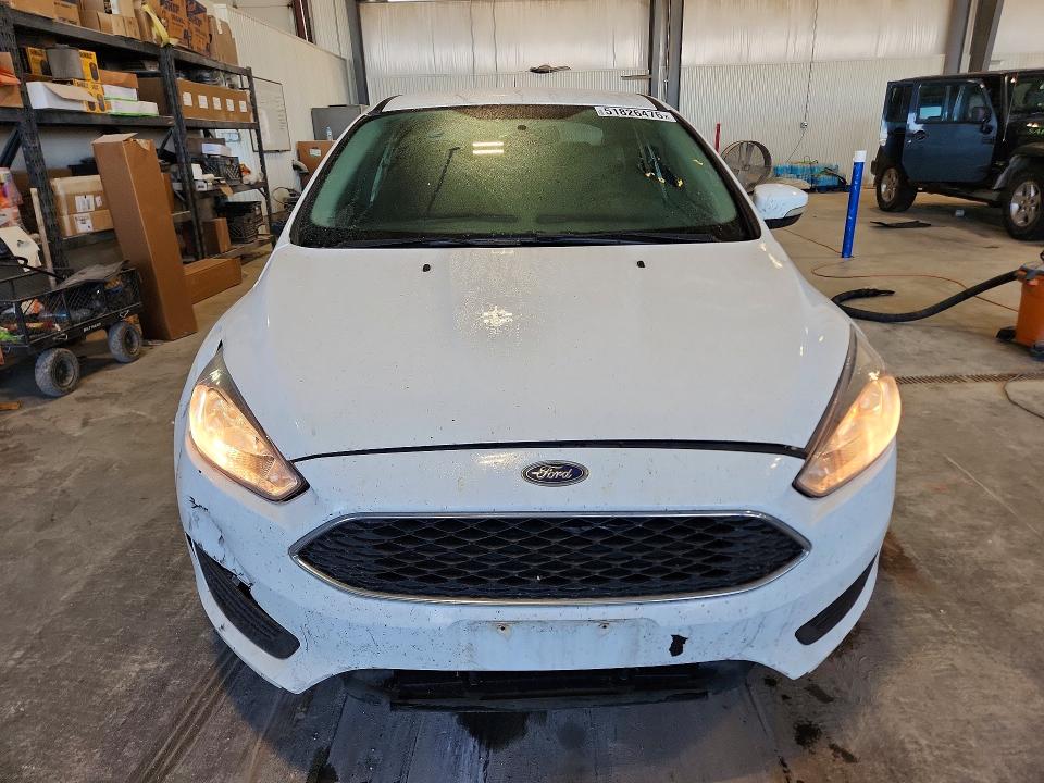 2016 Ford Focus VIN 1FADP3F27GL282188 COPART salvage auction — SIDE, Mn - Cert Of Title-Prior Salvage, sold $575 on 2026-07-09 (photo 5)