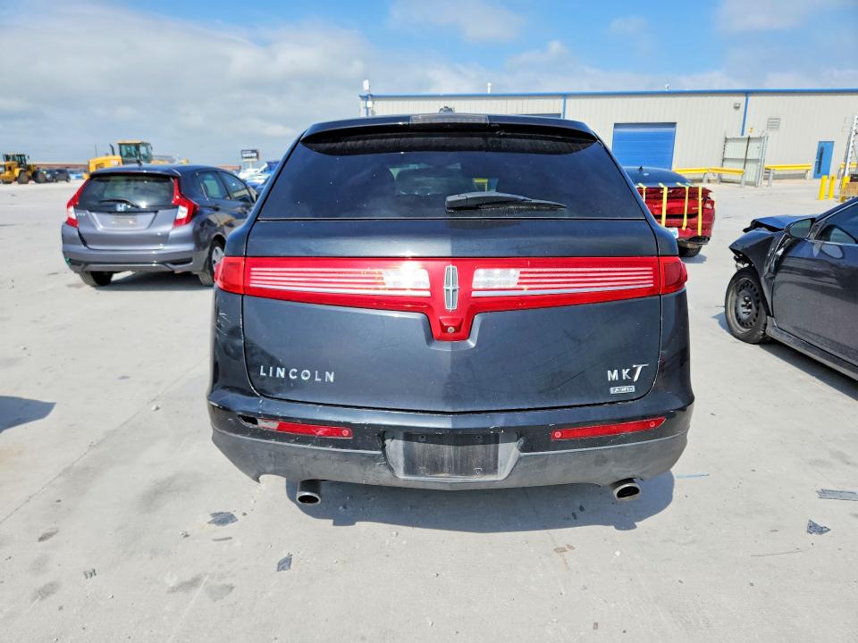 2015 Lincoln Mkt VIN 2LMHJ5NK3FBL00758 COPART salvage auction — SIDE, Tx - Salvage Vehicle Title, sold $450 on 2026-07-03 (photo 6)