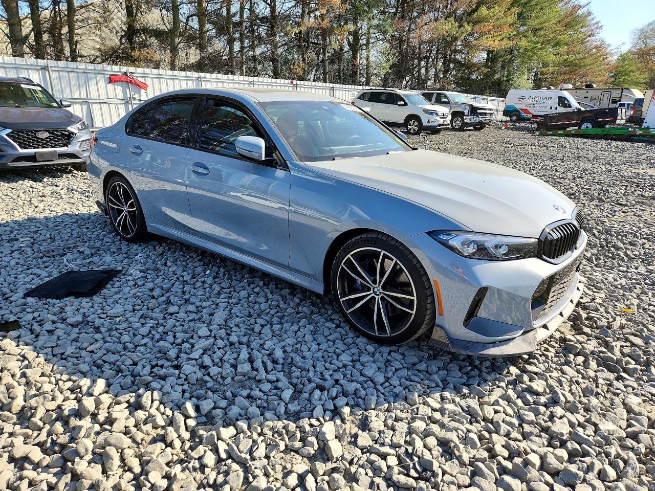 2023 BMW 3 Series VIN 3MW89FF09P8D03052 COPART salvage auction — Side, ID - SALVAGE CERTIFICATE OF TITLE, sold $25,250 on 2026-08-12 (photo 4)