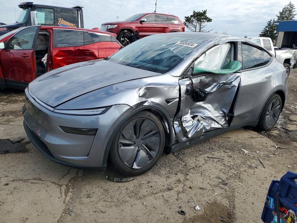 2026 Tesla Model y VIN 7SAYGDEE2TF425111 COPART salvage auction — SIDE, MI - CERT OF TITLE-SALVAGE VEHICLE, sold $19,200 on 2026-07-07 (photo 1)