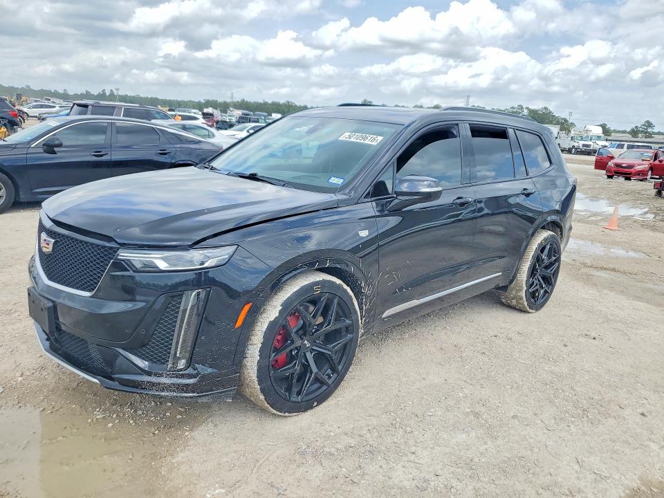 2023 Cadillac Xt6 VIN 1GYKPGRS5PZ135086 COPART salvage auction — WATER/FLOOD, Tx - Salvage Title-Flood Damage, sold $15,400 on 2026-07-14 (photo 1)