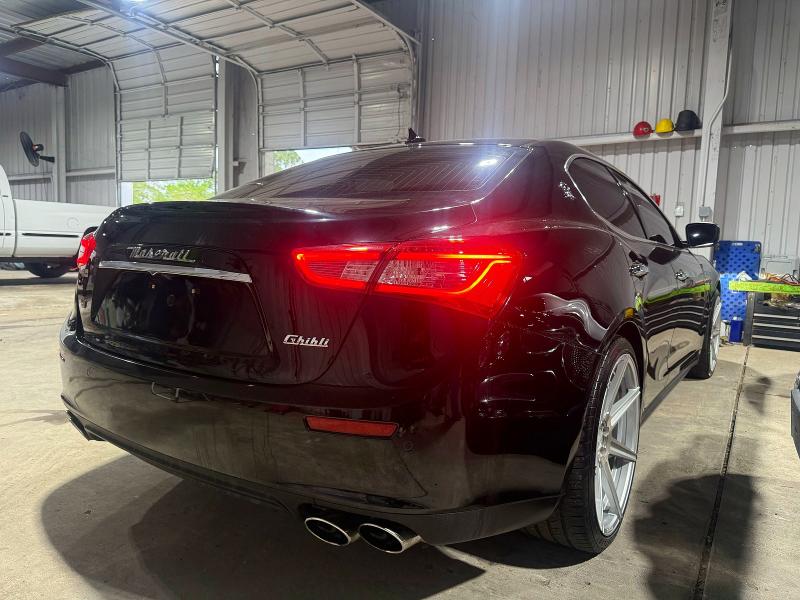 2014 Maserati Ghibli VIN ZAM57RTA9E1112724 COPART salvage auction — DAMAGE HISTORY, Co - Salvage Title (P), sold $17,600 on 2026-07-10 (photo 4)