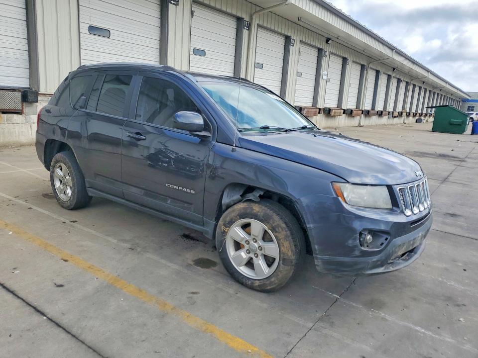 2016 Jeep Compass VIN 1C4NJCEA5GD543255 COPART salvage auction — SIDE, IN - CERT OF TITLE-SALVAGE TITLE, sold $825 on 2026-08-03 (photo 4)