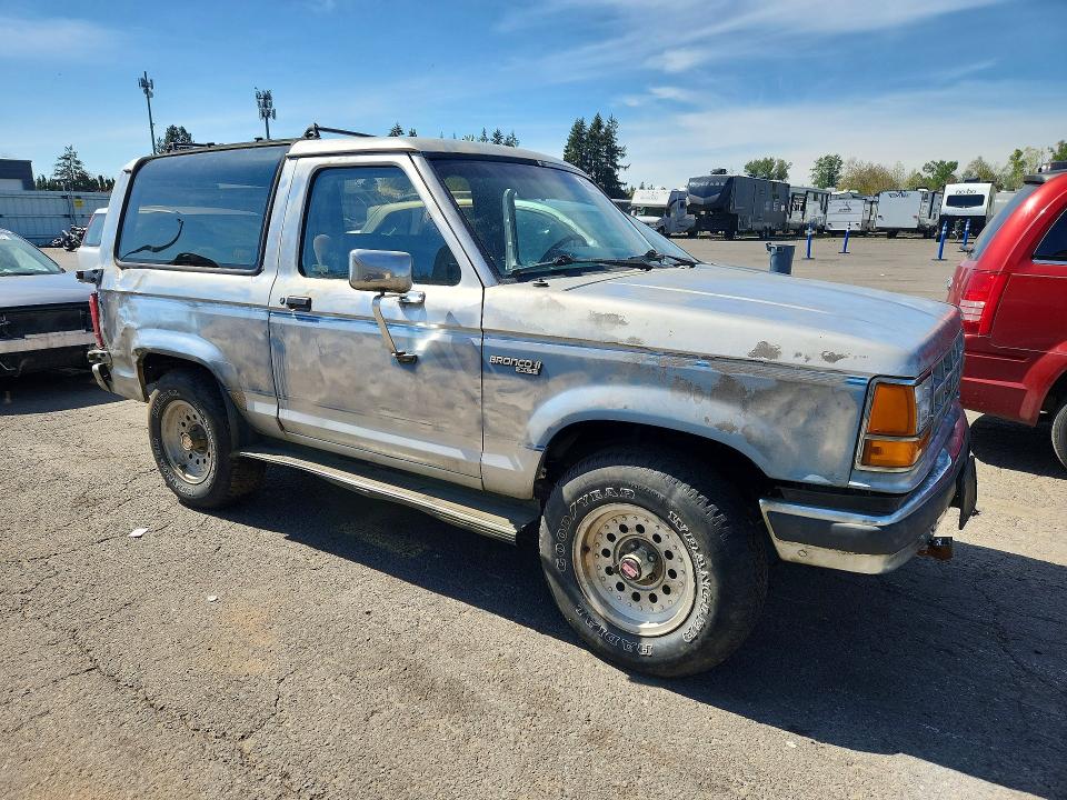 1989 Ford Bronco VIN 1FMCU14T5KUC50398 COPART salvage auction — REAR END, Or - Cert Of Title-Reconstructed, sold $650 on 2026-07-07 (photo 4)