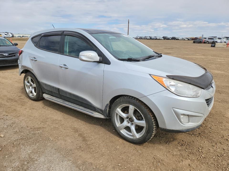 2011 Hyundai Tucson VIN KM8JUCAC0BU275328 COPART salvage auction — REAR END, AB - BOS - SALVAGE, sold $275 on 2026-07-28 (photo 4)