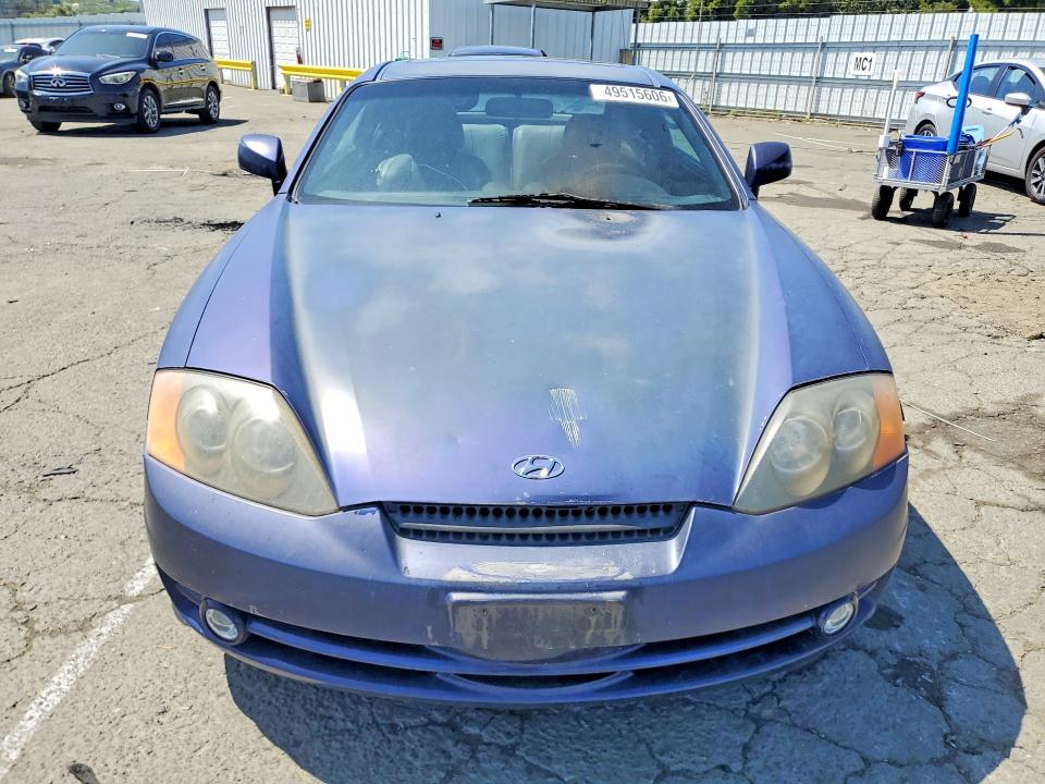 2003 Hyundai Tiburon VIN KMHHN65F03U017880 COPART salvage auction — ENGINE BURN, Ca - Salvage Certificate, sold $200 on 2026-07-10 (photo 5)