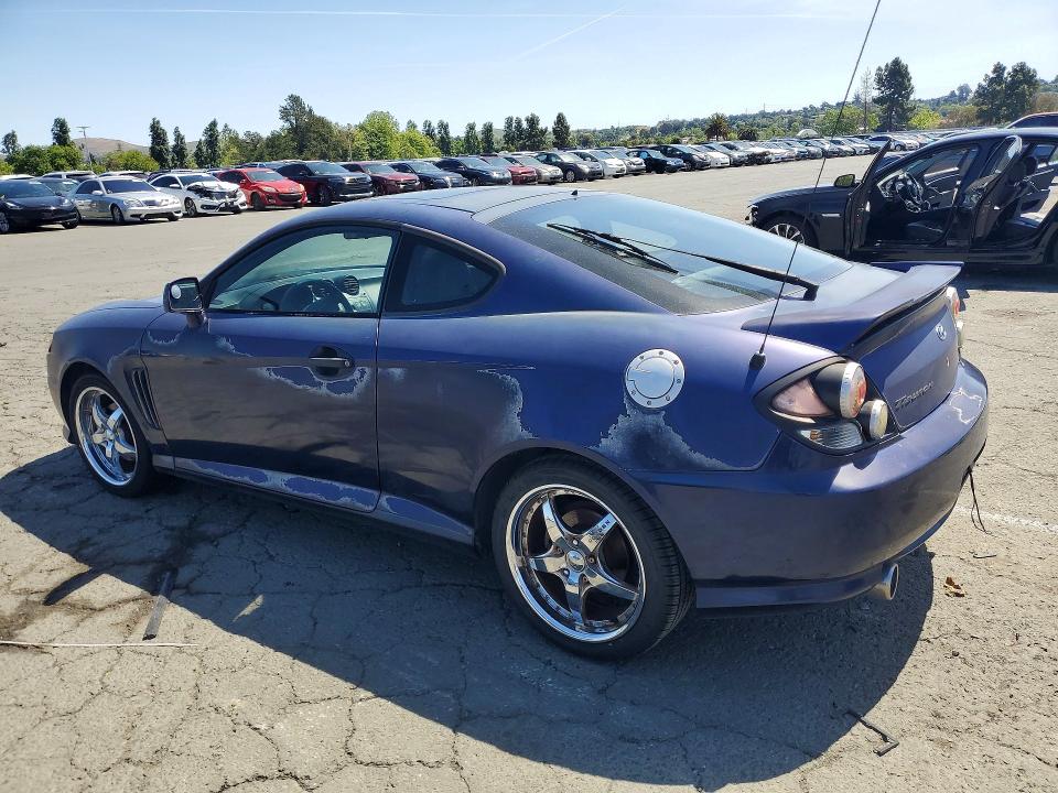 2003 Hyundai Tiburon VIN KMHHN65F03U017880 COPART salvage auction — ENGINE BURN, Ca - Salvage Certificate, sold $200 on 2026-07-10 (photo 2)