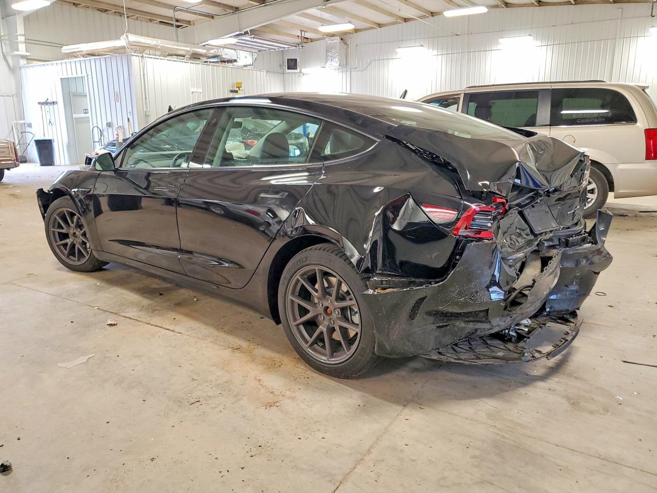 2023 Tesla Model 3 VIN 5YJ3E1EB7PF591423 COPART salvage auction — Rear End, MN - CERT OF TITLE-SALVAGE, sold $3,350 on 2026-05-28 (photo 2)