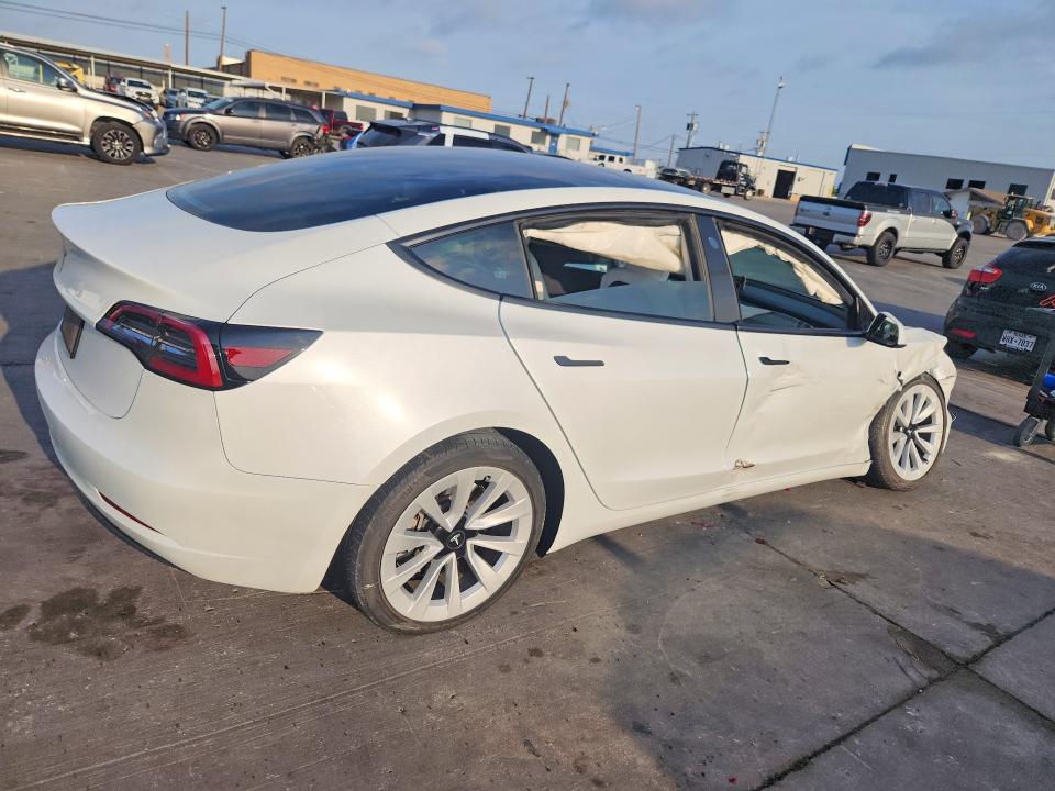 2023 Tesla Model 3 VIN 5YJ3E1EA7PF472150 COPART salvage auction — SIDE, Salvage Title, sold $6,600 on 2026-07-27 (photo 3)
