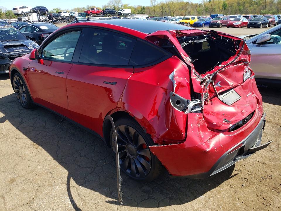 2022 Tesla Model y VIN 7SAYGDEF0NF309773 COPART salvage auction — REAR END, Salvage Title, sold $7,000 on 2026-07-14 (photo 2)