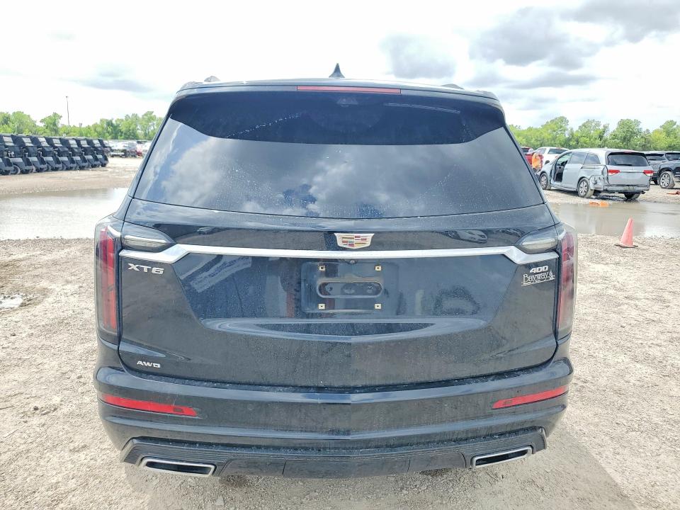 2023 Cadillac Xt6 VIN 1GYKPGRS5PZ135086 COPART salvage auction — WATER/FLOOD, Tx - Salvage Title-Flood Damage, sold $15,400 on 2026-07-14 (photo 6)
