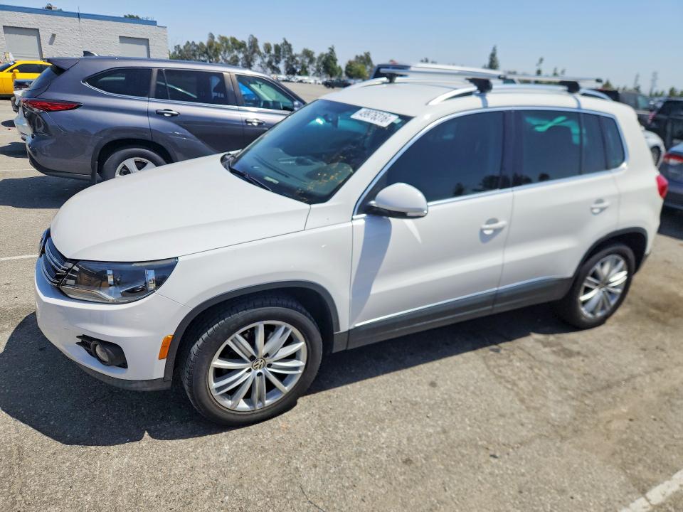 2014 Volkswagen Tiguan VIN WVGAV3AX4EW550496 COPART salvage auction — MECHANICAL, Fl - Derelict Vehicle Certificate (P), sold $4,100 on 2026-07-30 (photo 1)