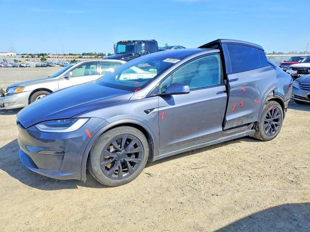 2023 Tesla Model x VIN 7SAXCAE57PF392831 COPART salvage auction — REAR END, Ca - Salvage Certificate, sold $12,100 on 2026-07-30 (photo 1)