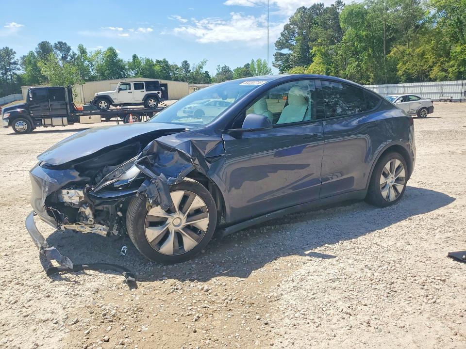 2023 Tesla Model y VIN 7SAYGDEE3PA185036 COPART salvage auction — FRONT END, Nc - Salvage Certificate Of Title, sold $12,100 on 2026-07-17 (photo 1)