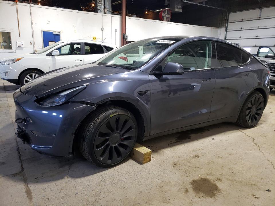 2022 Tesla Model y VIN 7SAYGDEF4NF462981 COPART salvage auction — FRONT END, Mn - Cert Of Title-Salvage, sold $9,200 on 2026-07-07 (photo 1)