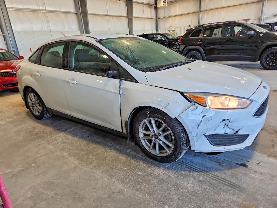 2016 Ford Focus VIN 1FADP3F27GL282188 COPART salvage auction — SIDE, Mn - Cert Of Title-Prior Salvage, sold $575 on 2026-07-09 (photo 4)