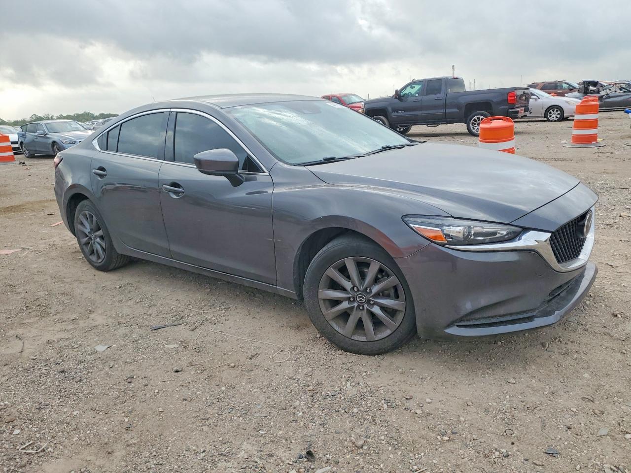 2021 Mazda 6 VIN JM1GL1UM5M1609352 COPART salvage auction — Side, TX - CERTIFICATE OF TITLE, sold $4,050 on 2026-07-09 (photo 4)