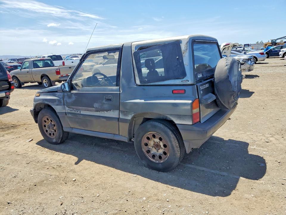 1989 Suzuki Sidekick VIN JS3TA01C5K4112583 COPART salvage auction — MINOR DENT/SCRATCHES, CA - DIS/DLR/EXP ONLY CLEAN TITLE, sold $1,700 on 2026-09-16 (photo 2)