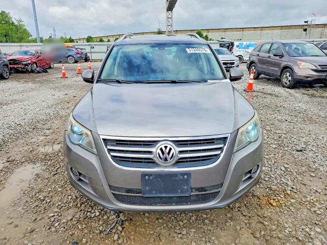 2010 Volkswagen Tiguan VIN WVGBV7AX9AW532050 COPART salvage auction — WATER/FLOOD, OH - CERT OF TITLE-SALVAGE FLOOD, sold $525 on 2026-08-11 (photo 5)