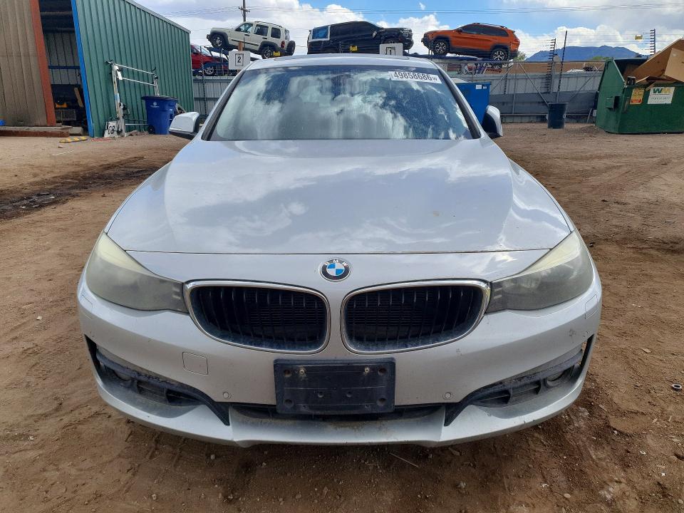 2015 BMW 3er VIN WBA3X5C52FD560078 COPART salvage auction — MINOR DENT/SCRATCHES, Tx - Dis/Dlr/Exp Only Salvage Title, sold $1,050 on 2026-07-08 (photo 5)