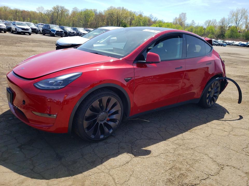 2022 Tesla Model y VIN 7SAYGDEF0NF309773 COPART salvage auction — REAR END, Salvage Title, sold $7,000 on 2026-07-14 (photo 1)