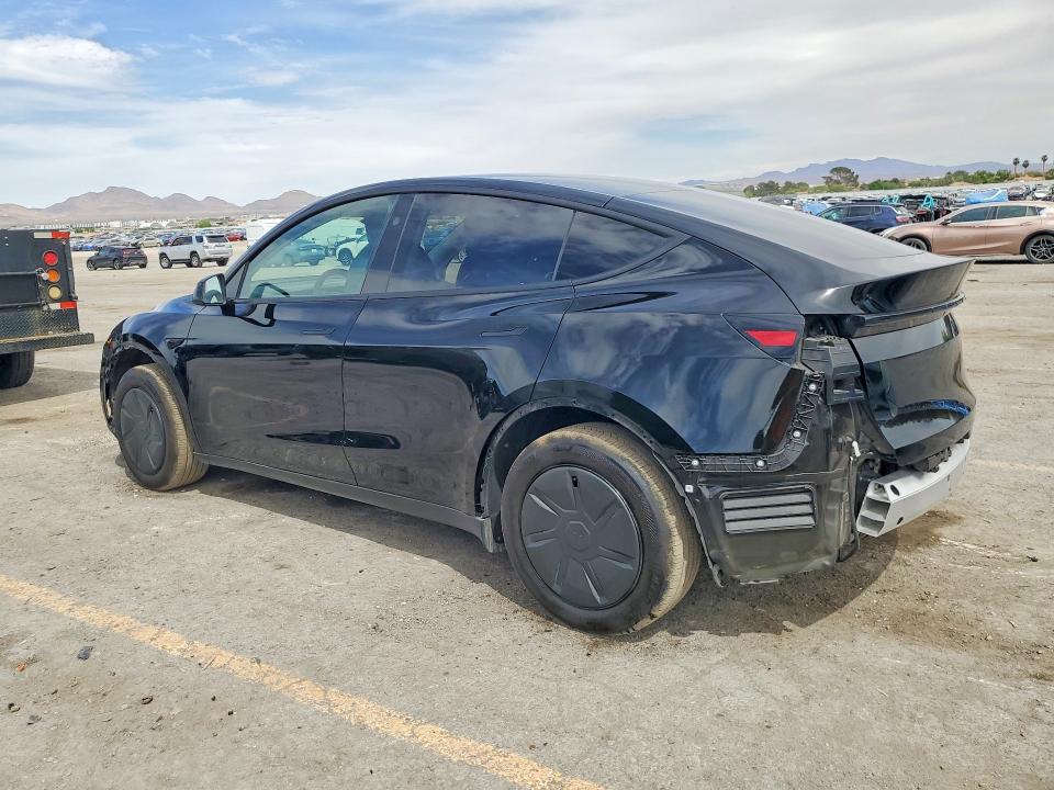 2026 Tesla Model y VIN 7SAYGDED7TA595033 COPART salvage auction — SIDE, Nv - Salvage Title, sold $17,100 on 2026-07-02 (photo 2)