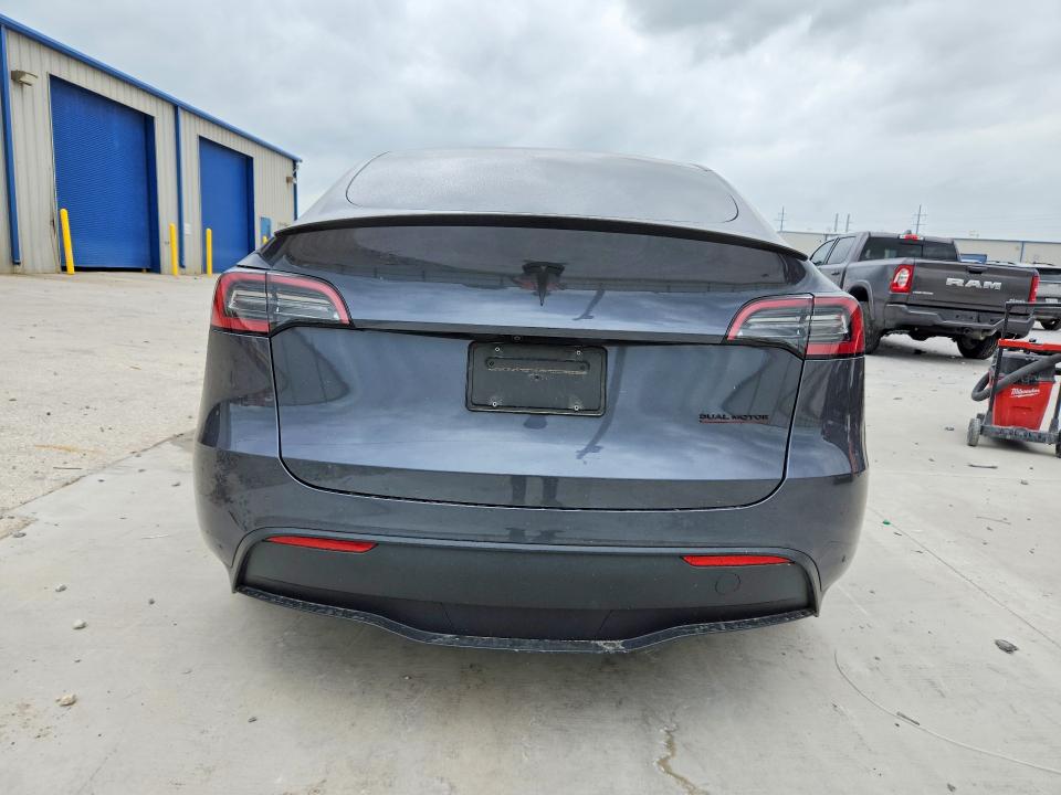 2023 Tesla Model y VIN 7SAYGDEF6PF620921 COPART salvage auction — FRONT END, Tx - Certificate Of Title, sold $5,100 on 2026-07-17 (photo 6)